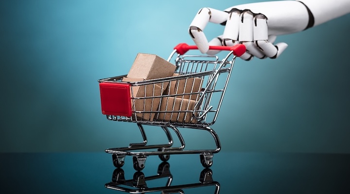 Robot holding shopping cart with cardboard boxes