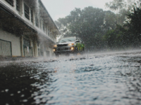 Car driving in heavy rain.