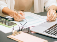 Business owner working on cashflow calculations