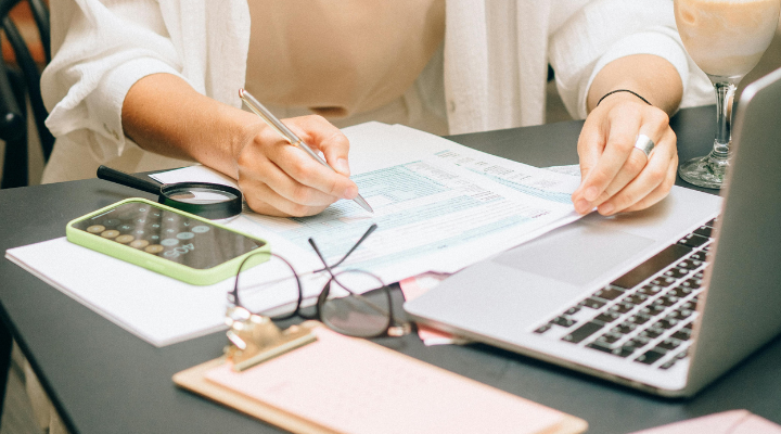 Business owner working on cashflow calculations