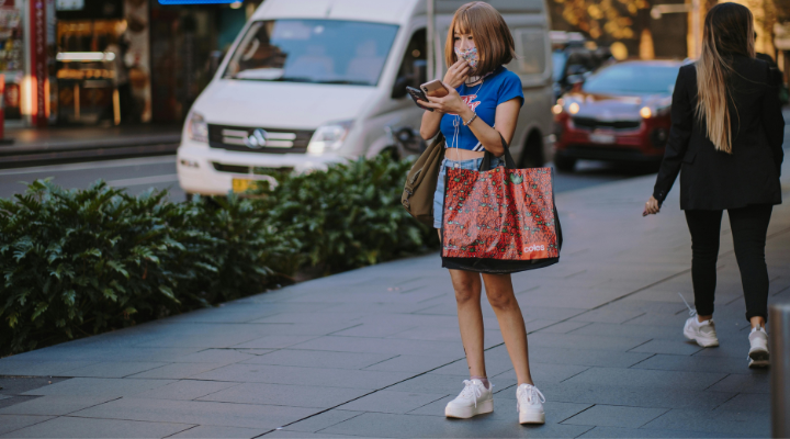 Coles shopper on Sydney footpath