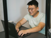 Man typing on laptop