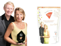 Martin and Melissa, owners of Bondi Chai, pictured beside their chai latte packaging.