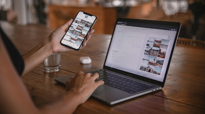 Person using laptop and phone