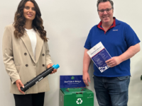 people-standing-beside-officeworks-recycling-box