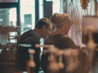 Cafe owners working in a cafe.