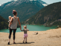 woman-and-kids-viewing-mountain-landscape