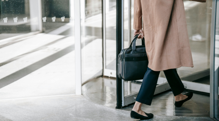 Woman revolving doors